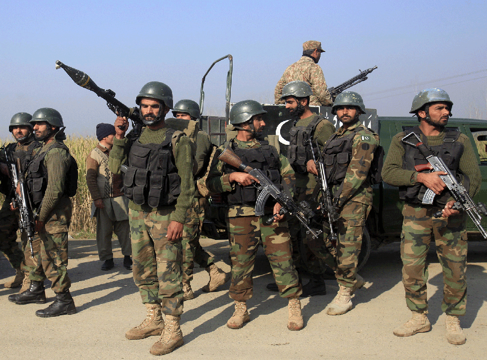 Pakistan army stand guard following suicide blasts in January 2016