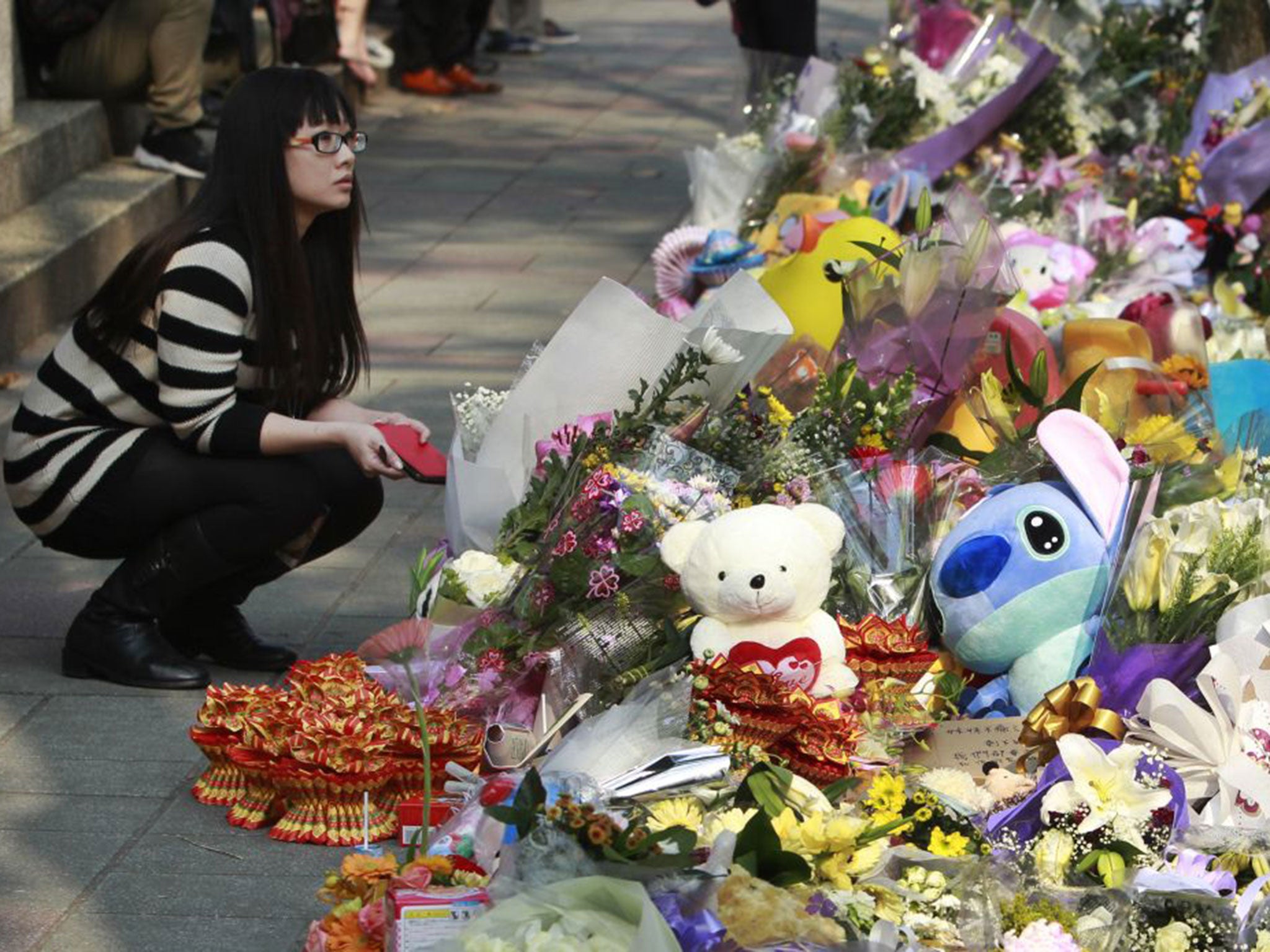 A shrine for the young girl who was also a victim of a knife attack