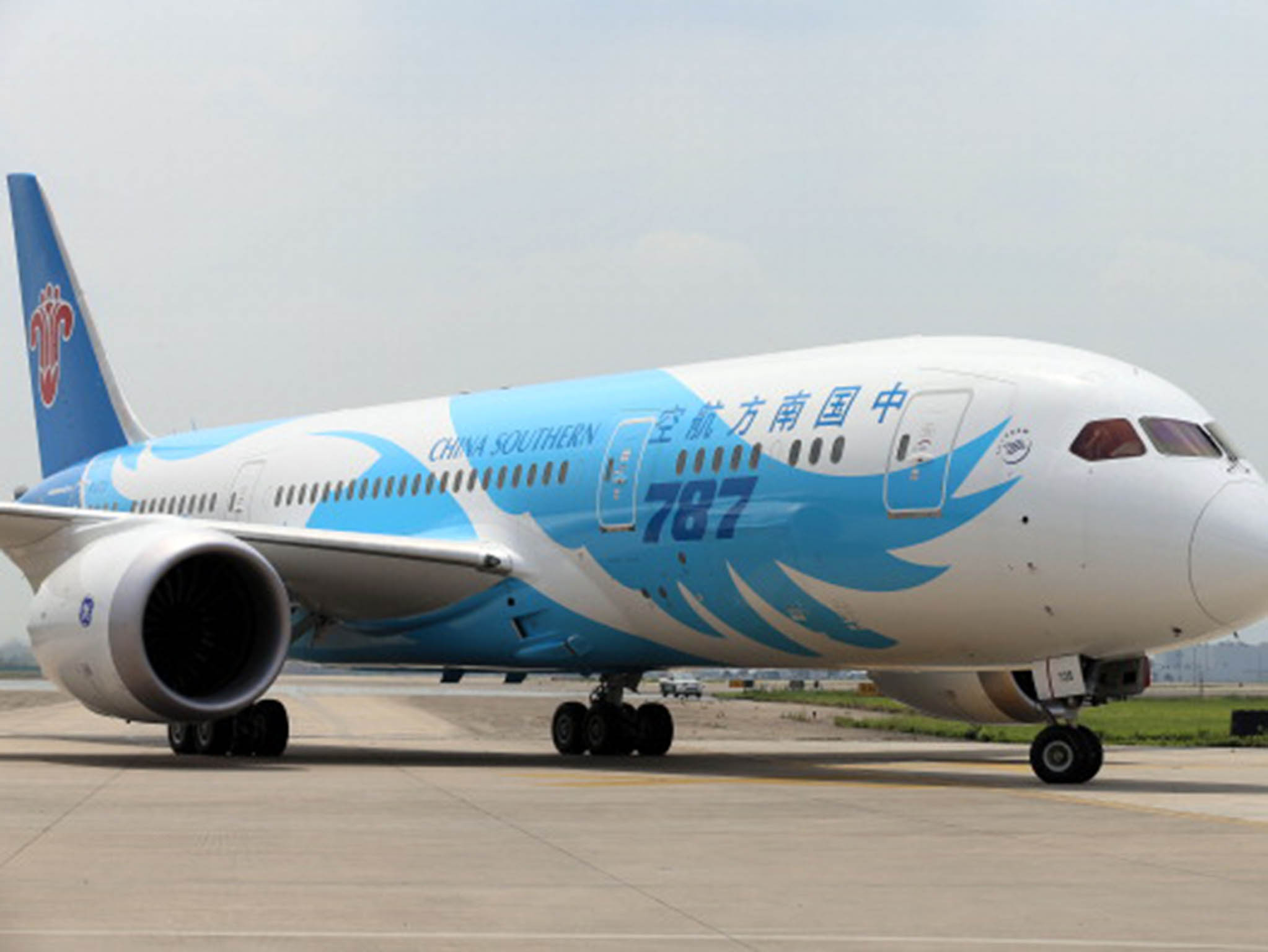 All passengers were removed from the China Southern Airlines flight while staff spent two hours putting the emergency slide away