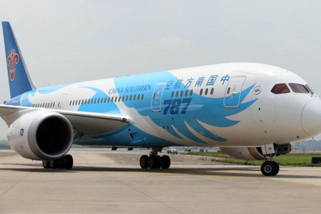 All passengers were removed from the China Southern Airlines flight while staff spent two hours putting the emergency slide away