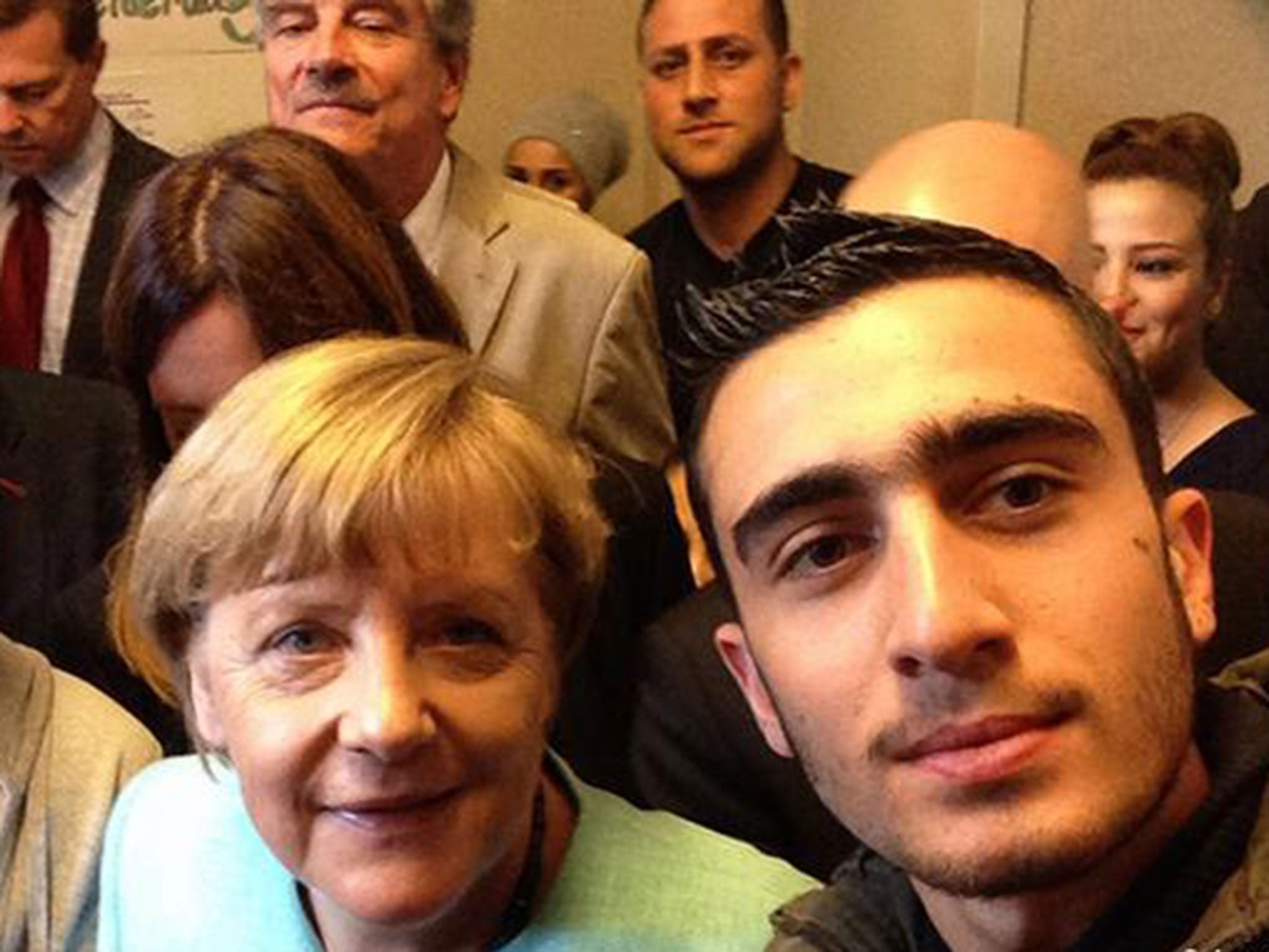 Anas Modamani took the photo when Angela Merkel visited the refugee camp in which he was living in Berlin. To his horror, it went viral this week after it was wrongly claimed that he was one of the men behind the Brussels Airport bomb