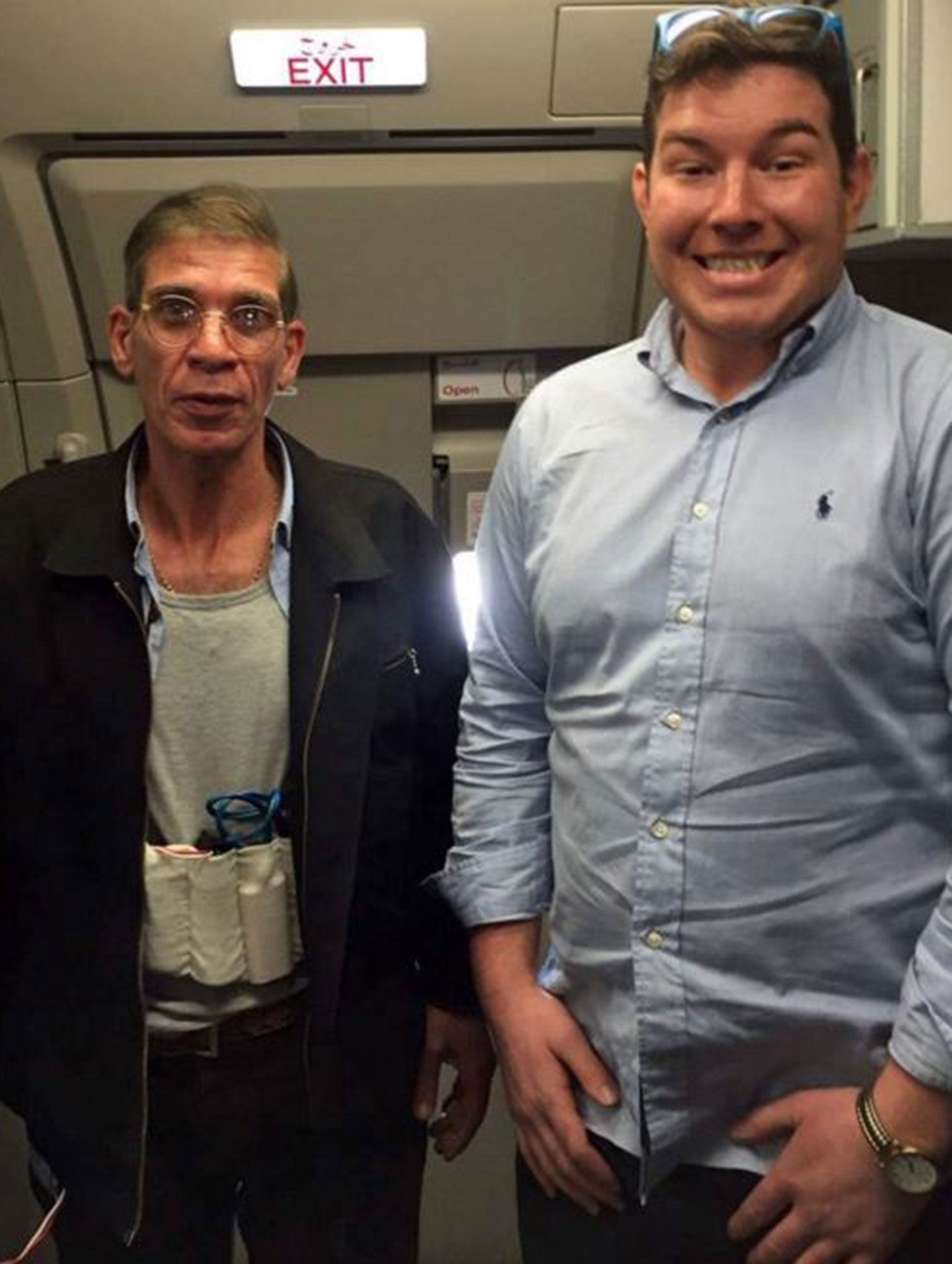 Ben Innes sent friends this image of himself with the hijacker on his mobile phone