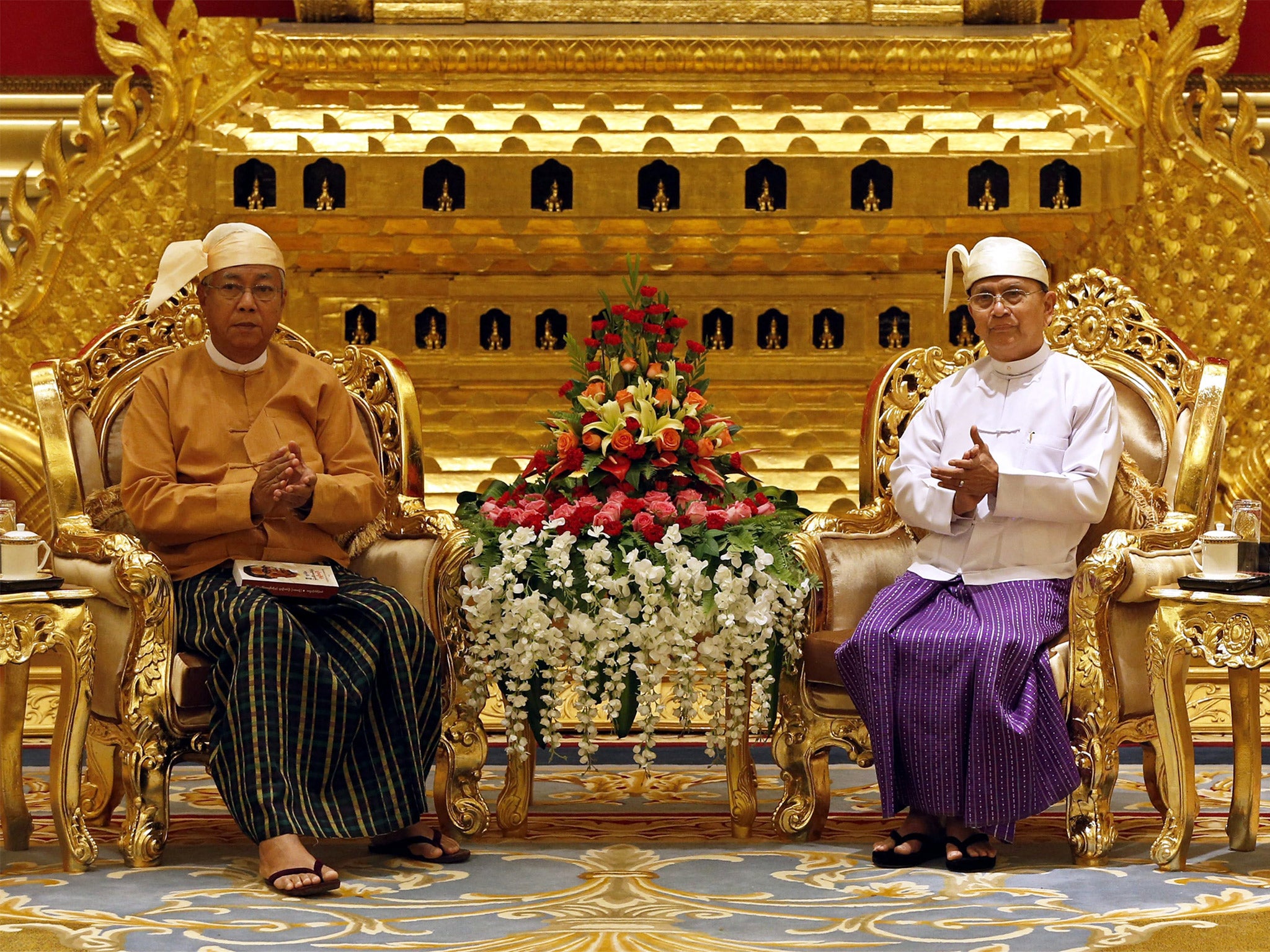 Burma's new president Htin Kyaw, left, and the outgoing Thein Sein