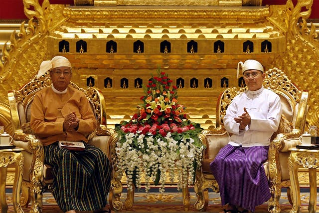 Burma's new president Htin Kyaw, left, and the outgoing Thein Sein