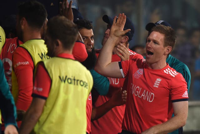 Captain Eoin Morgan celebrates after England recorded their win