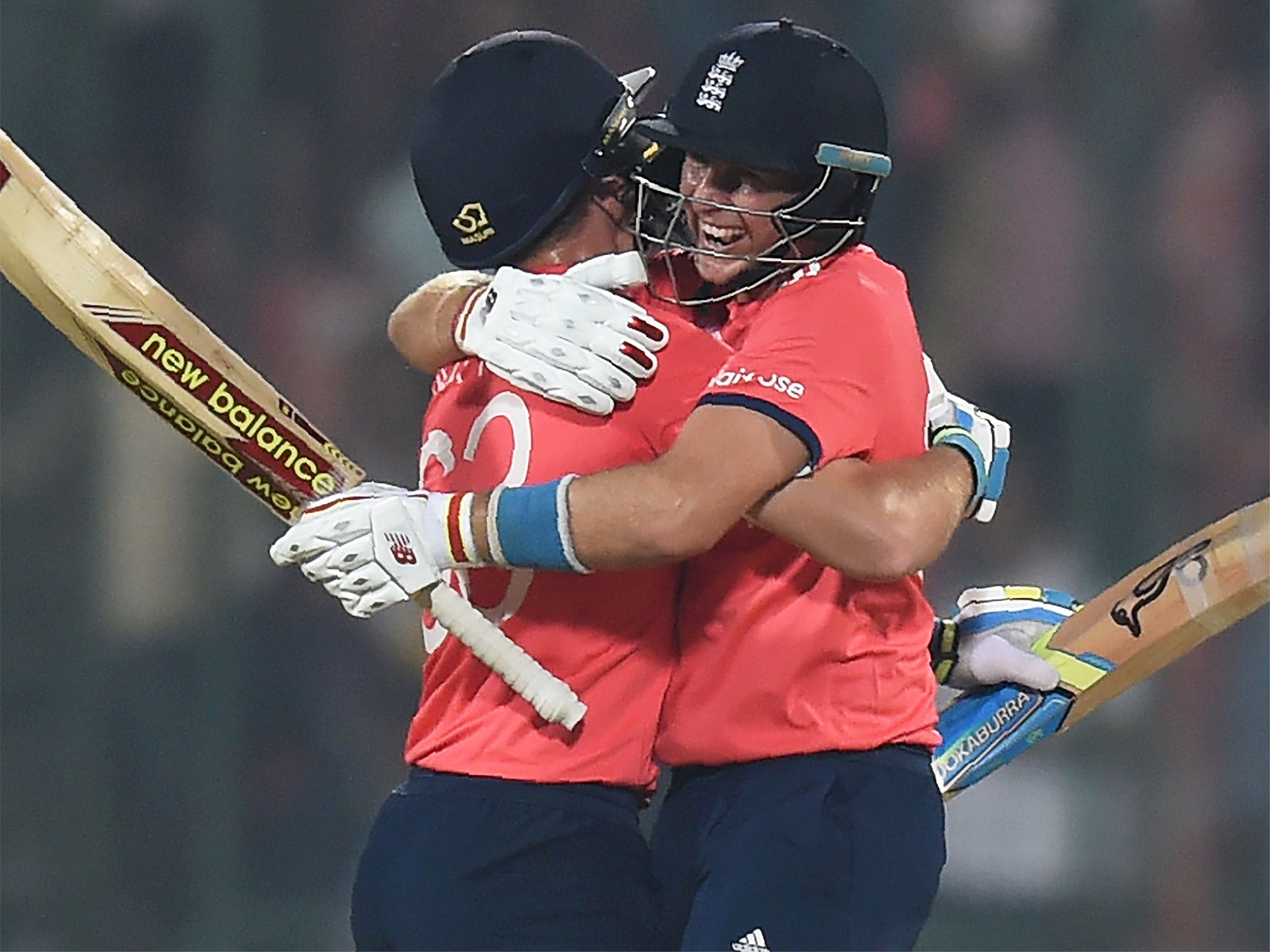 Jos Buttler and Joe Root celebrate England's semi-final victory