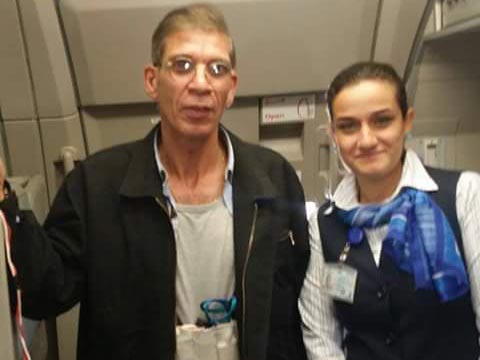 The air stewardess can be seen posing next to 59-year-old Seif Eldin Mustafa