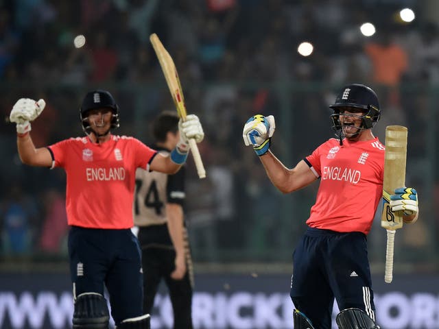Joe Root (left) and Jos Buttler celebrate England's victory over New Zealand