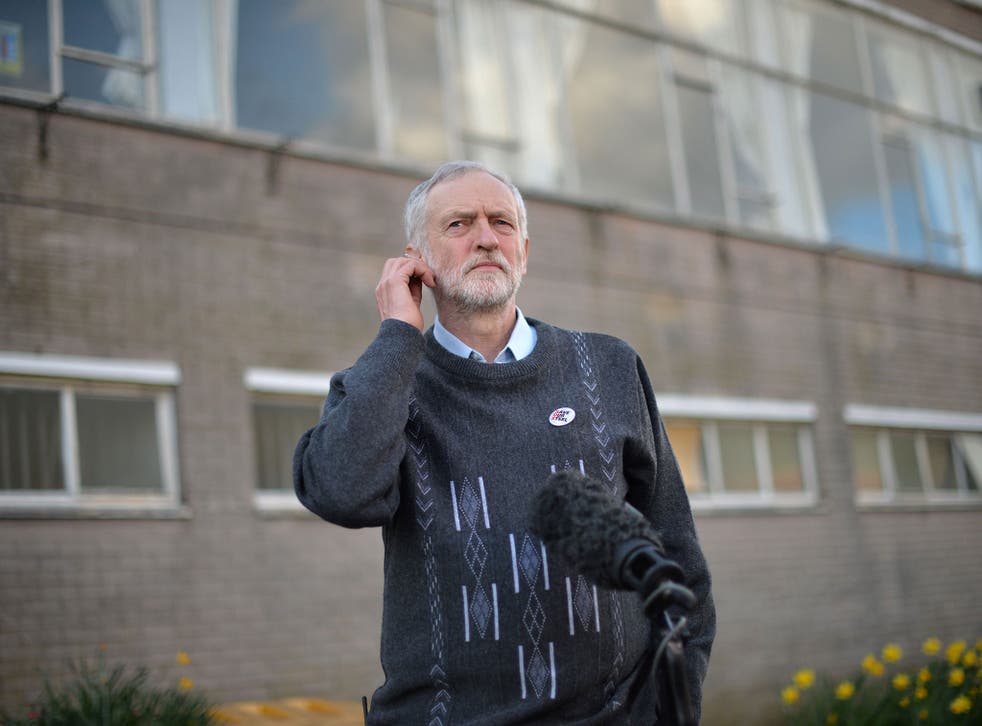 Opposition Labour Party leader Jeremy Corbyn waits to give a television interview after speaking to Tata Steel workers at the Tata sports and social club close to the company's works at Port Talbot, south Wales