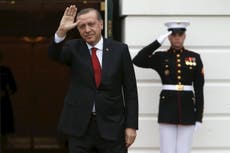 President Erdogan threatens to sue anyone who insults him