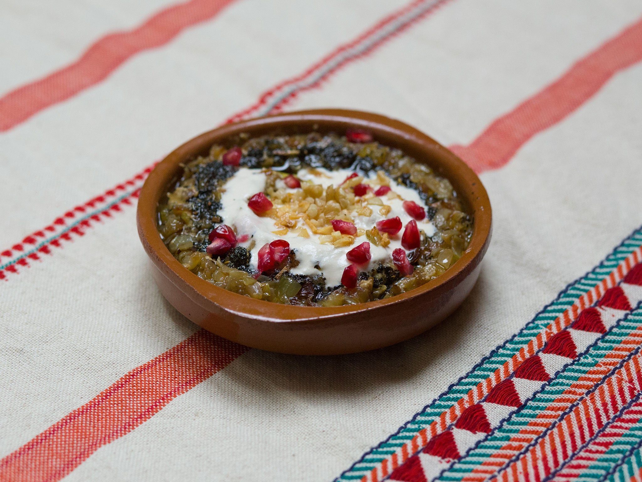 Zohreh's aubergine dip, decorated with pomegranate seeds