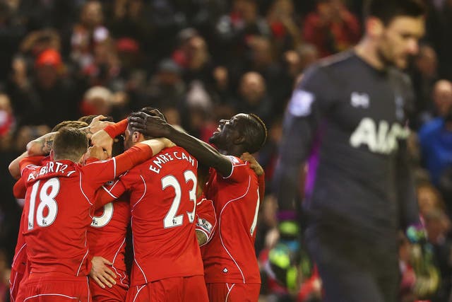Liverpool's players celebrate Mario Balotelli's late winner in the reverse fixture last season