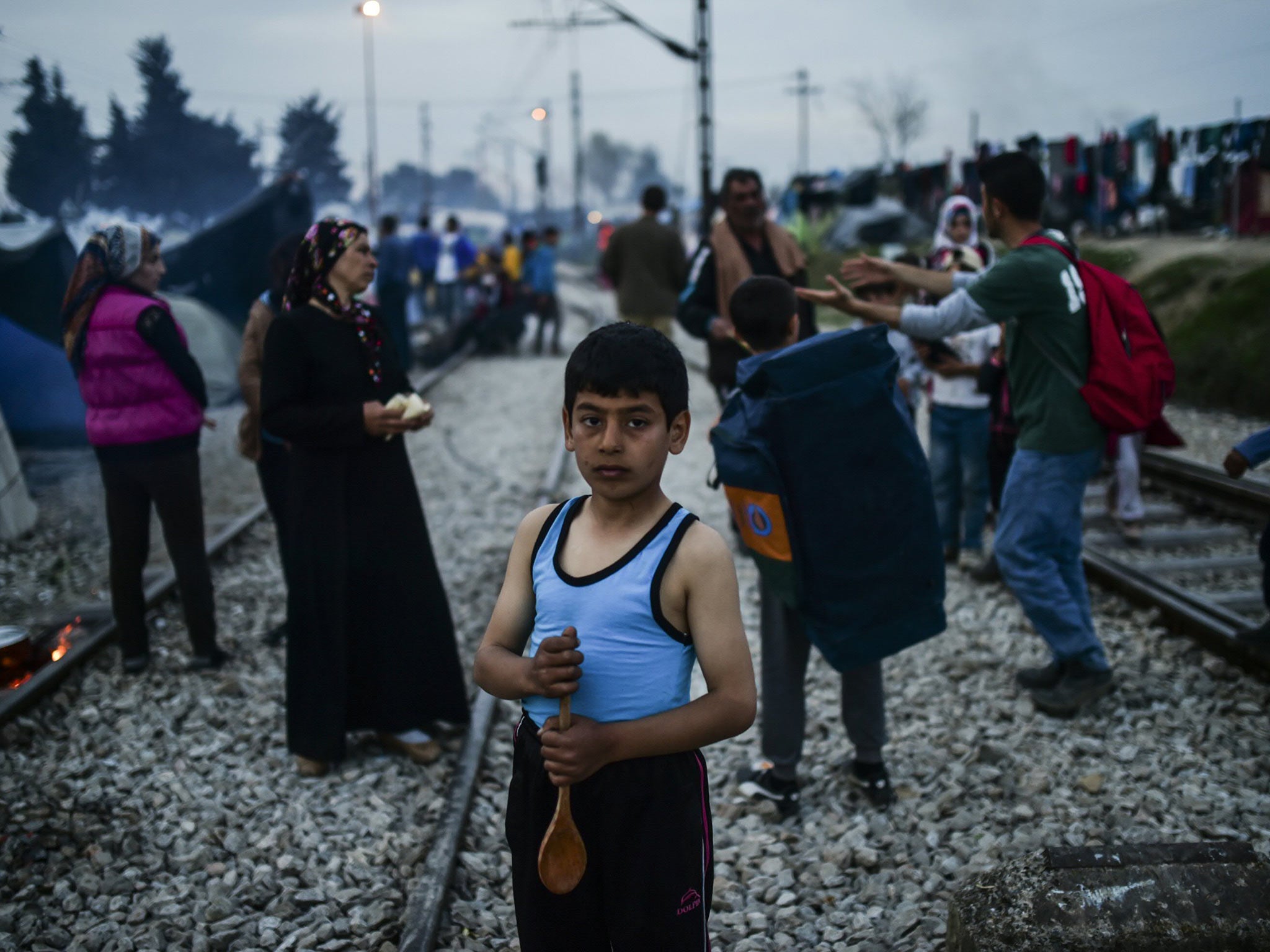 Refugees arriving in the Greek village of Idomeni