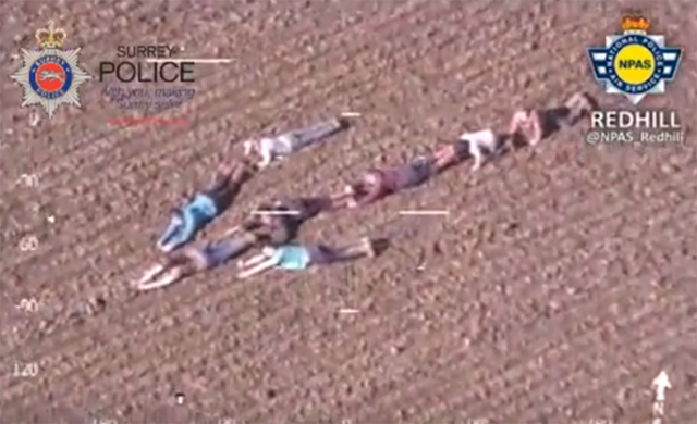 The human arrow formed of children on an Easter egg hunt in Capel, Surrey