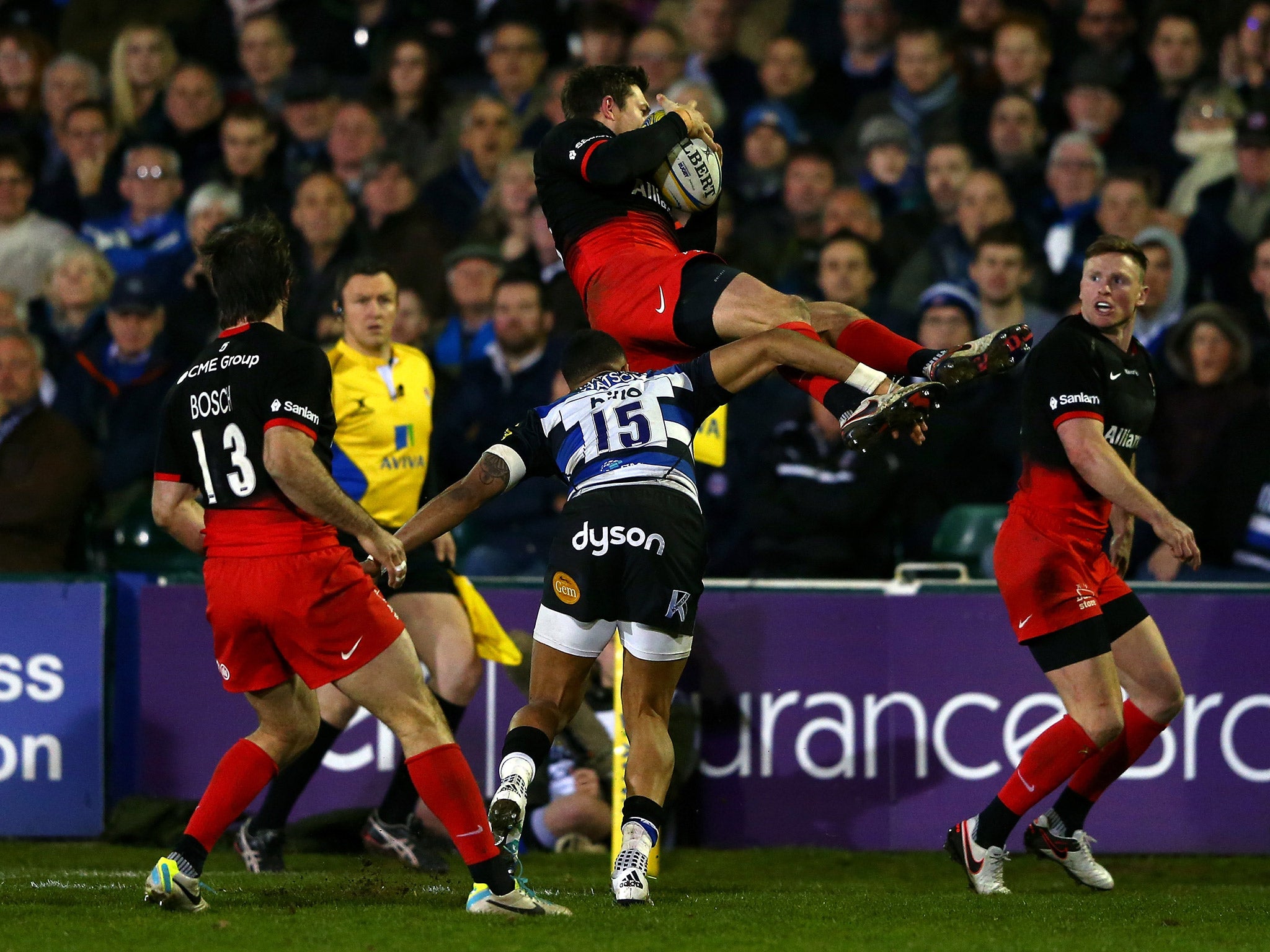 Alex Goode is tackled by Anthony Watson that led to a red card for the Bath back