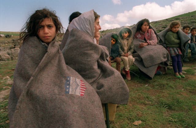 Iraqi Kurdish refugees in the mountains on the Turkish-Iranian borders, 1991: Vincent Amalvy/AFP/Getty Images