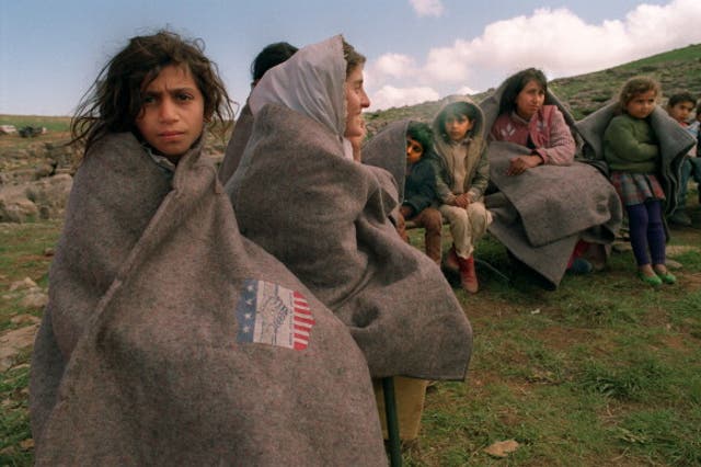 Iraqi Kurdish refugees in the mountains on the Turkish-Iranian borders, 1991: Vincent Amalvy/AFP/Getty Images