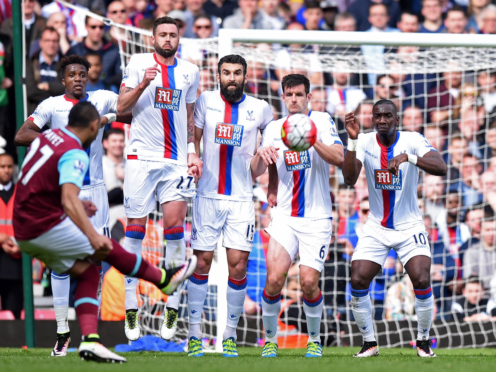 Dimitri Payet curls in a free-kick against Crystal Palace