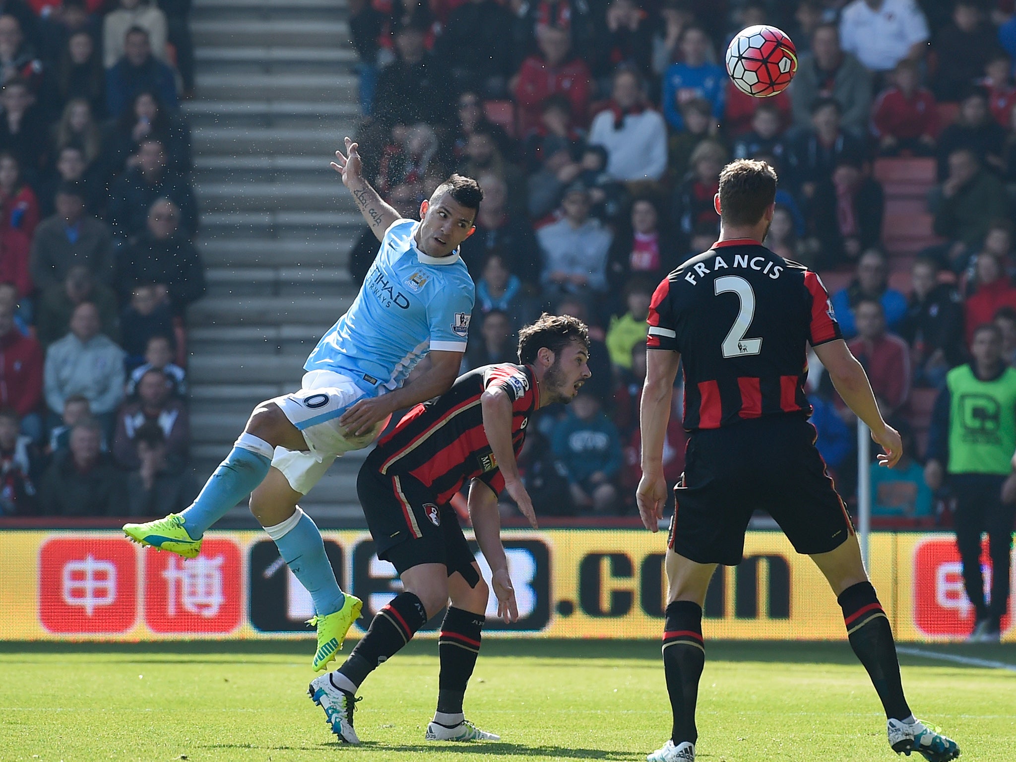 Sergio Aguero heads in Manchester City's third