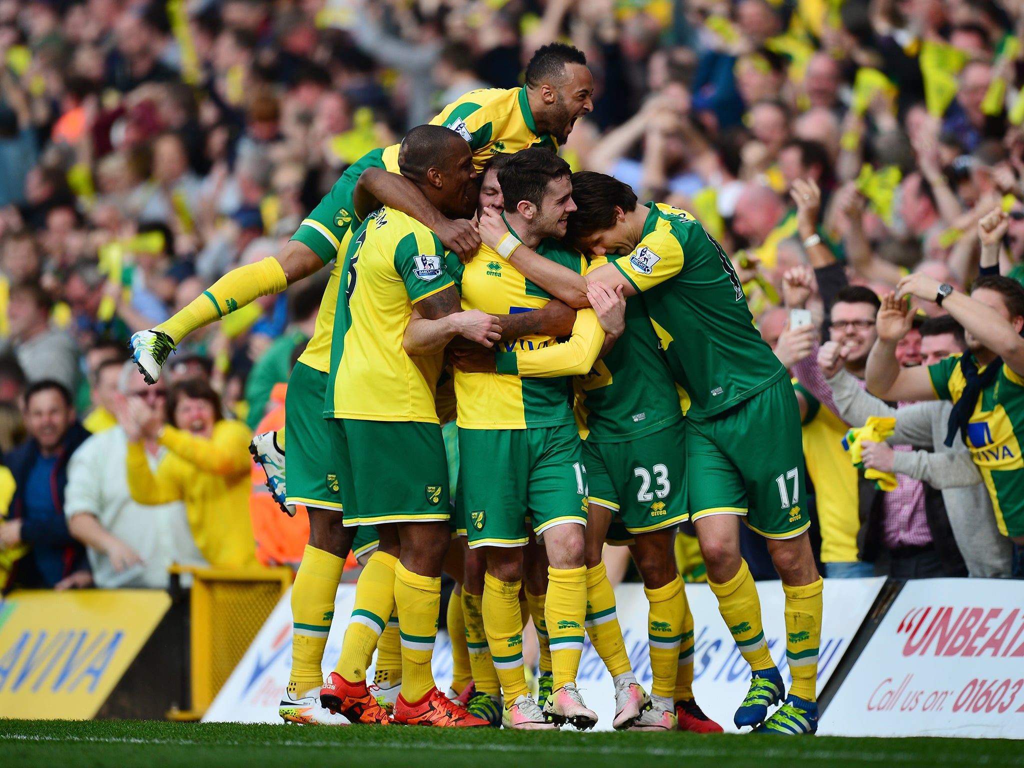Martin Olsson is mobbed by his team-mates after his goal