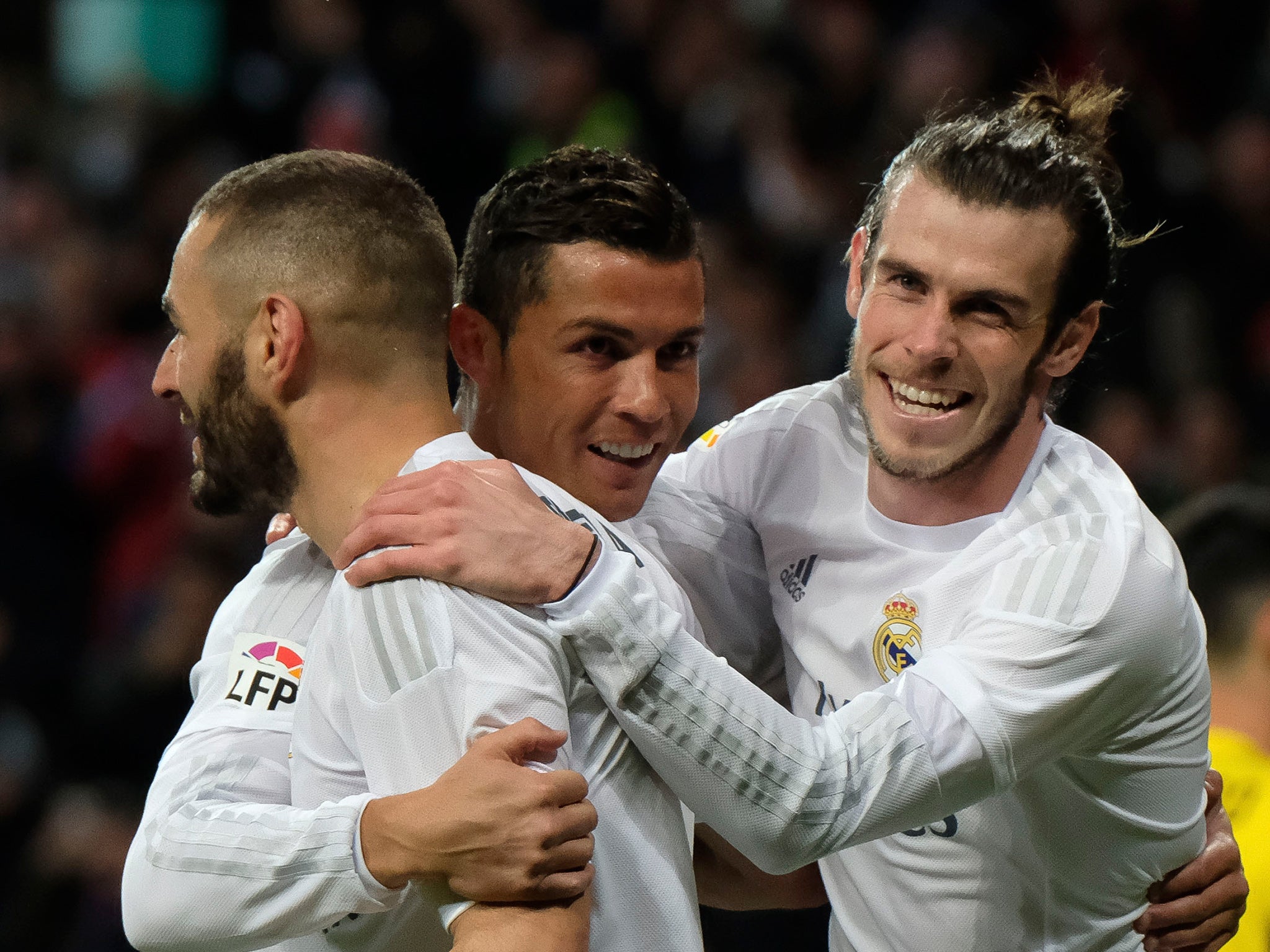 Karim Benzema, Cristiano Ronaldo and Gareth Bale celebrate