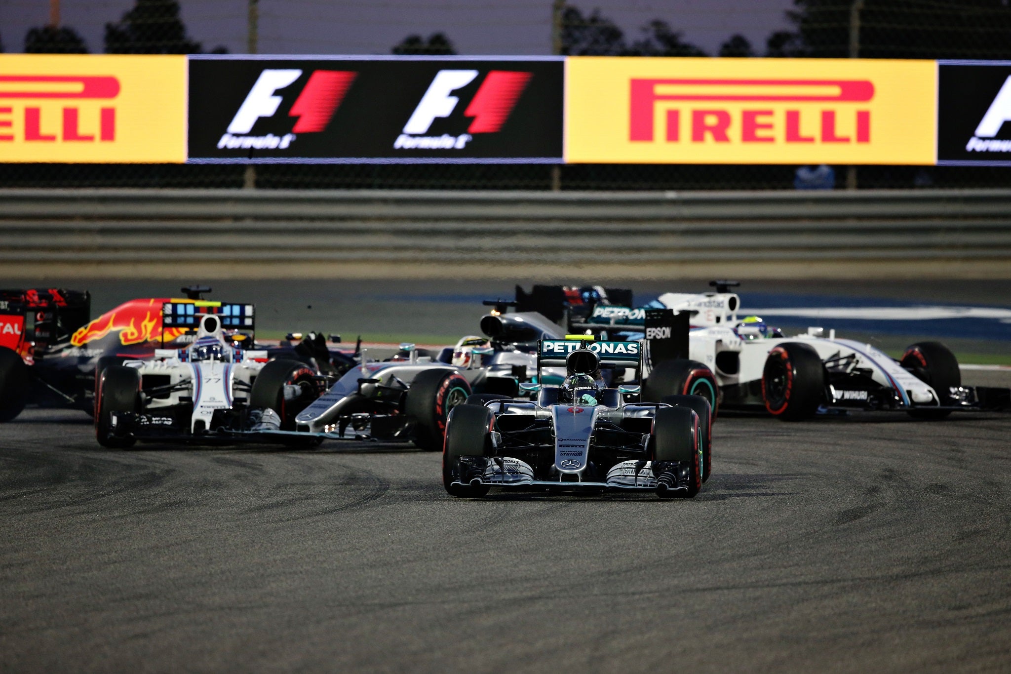 Lewis Hamilton is hit by Valtteri Bottas at the start of the Bahrain Grand Prix