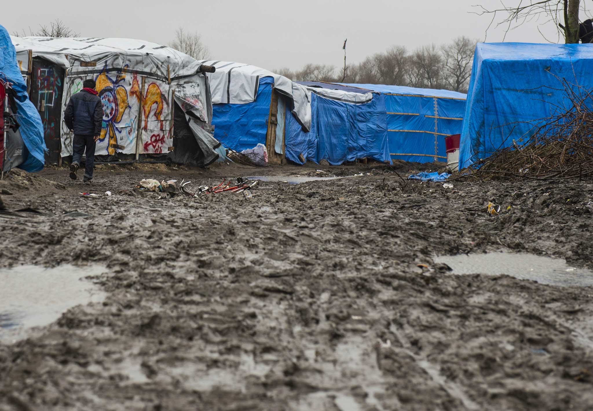 The camps in northern France and makeshift homes for thousands of transient refugees trying to reach Britain