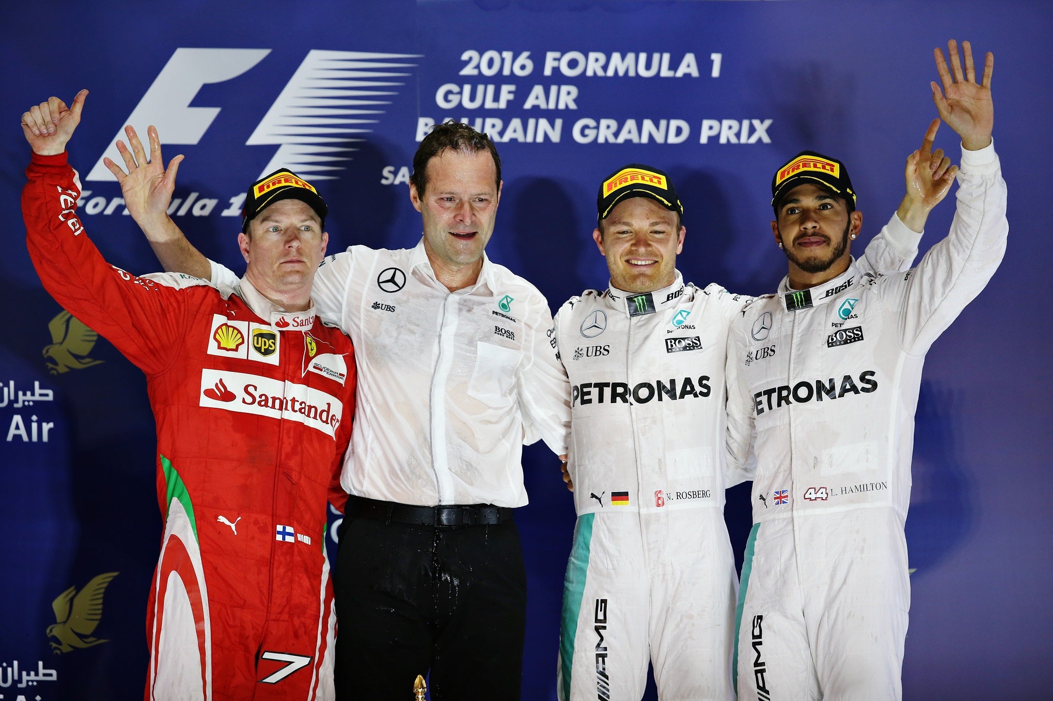 Nico Rosberg (C) finshed ahead of Kimi Raikkonen (L) and Lewis Hamilton (R)