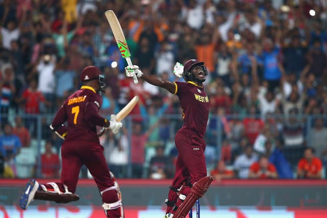 Carlos Brathwaite of the West Indies celebrates hitting the winning runs