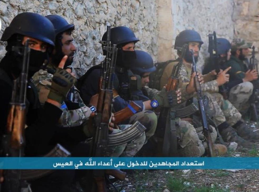 An image posted on the Twitter page of Syria's al-Qaida-linked Nusra Front on Friday, 1 April 2016, shows fighters from al-Qaida's branch in Syria, the Nusra Front