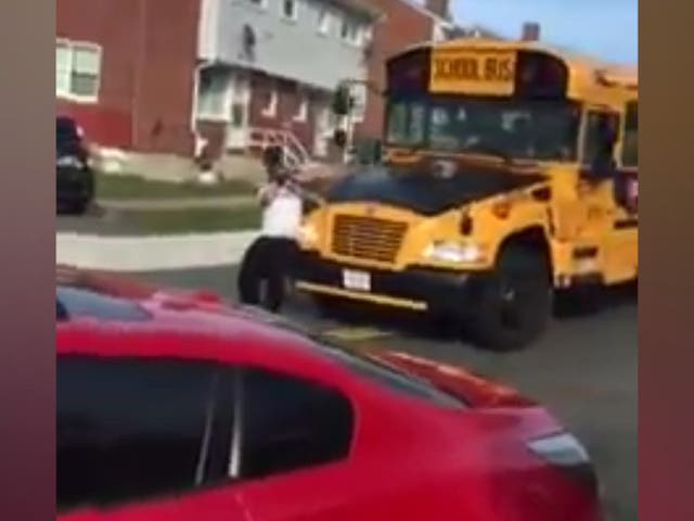 Father dragged away by school bus after driver refuses to let him pick up daughter