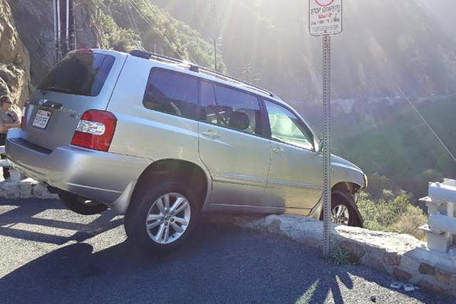 The SUV was found hanging off the edge of the cliff