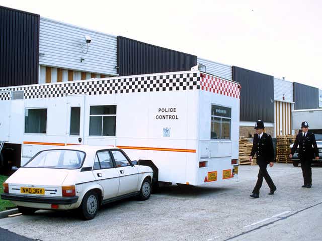 Policemen at the scene of the Brink’s Mat robbery at Heathrow airport in 1983