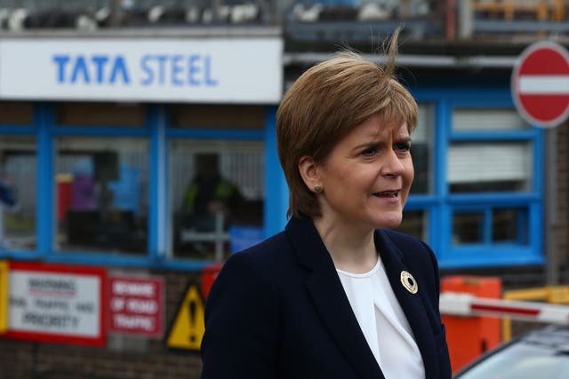 Scottish First Minister Nicola Sturgeon speaking to the media outside the Tata Steel plant in Motherwell last year. The SNP says that  Scotland will not be bound to using Chinese steel for Scottish infrastructure projects