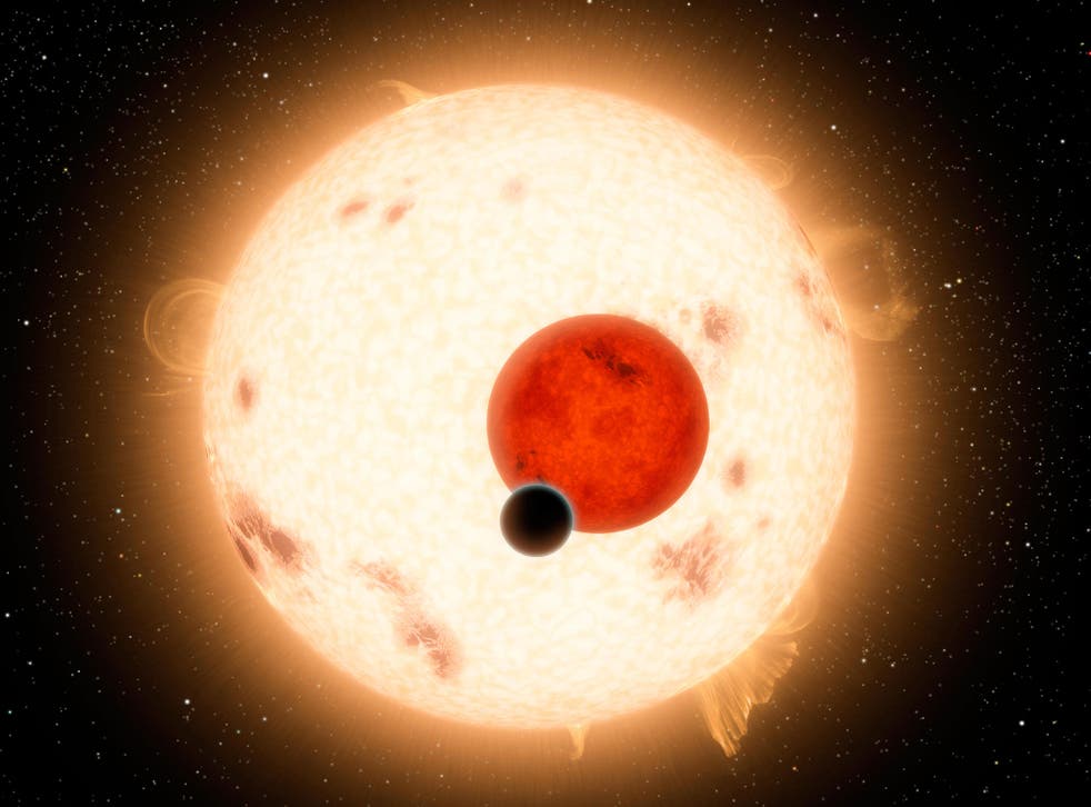 Kepler-16b orbits its two stars, one of them a red dwarf star