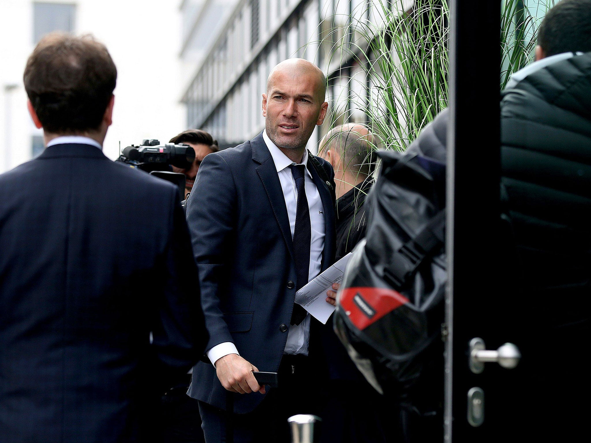 Zinedine Zidane arrives at a hotel in Wolfsburg