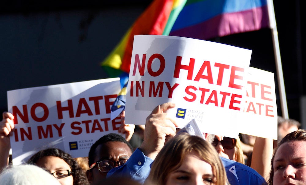Protesters call for Mississippi's governor to veto a so-called "religious freedom" bill that discriminates against LGBT people.
