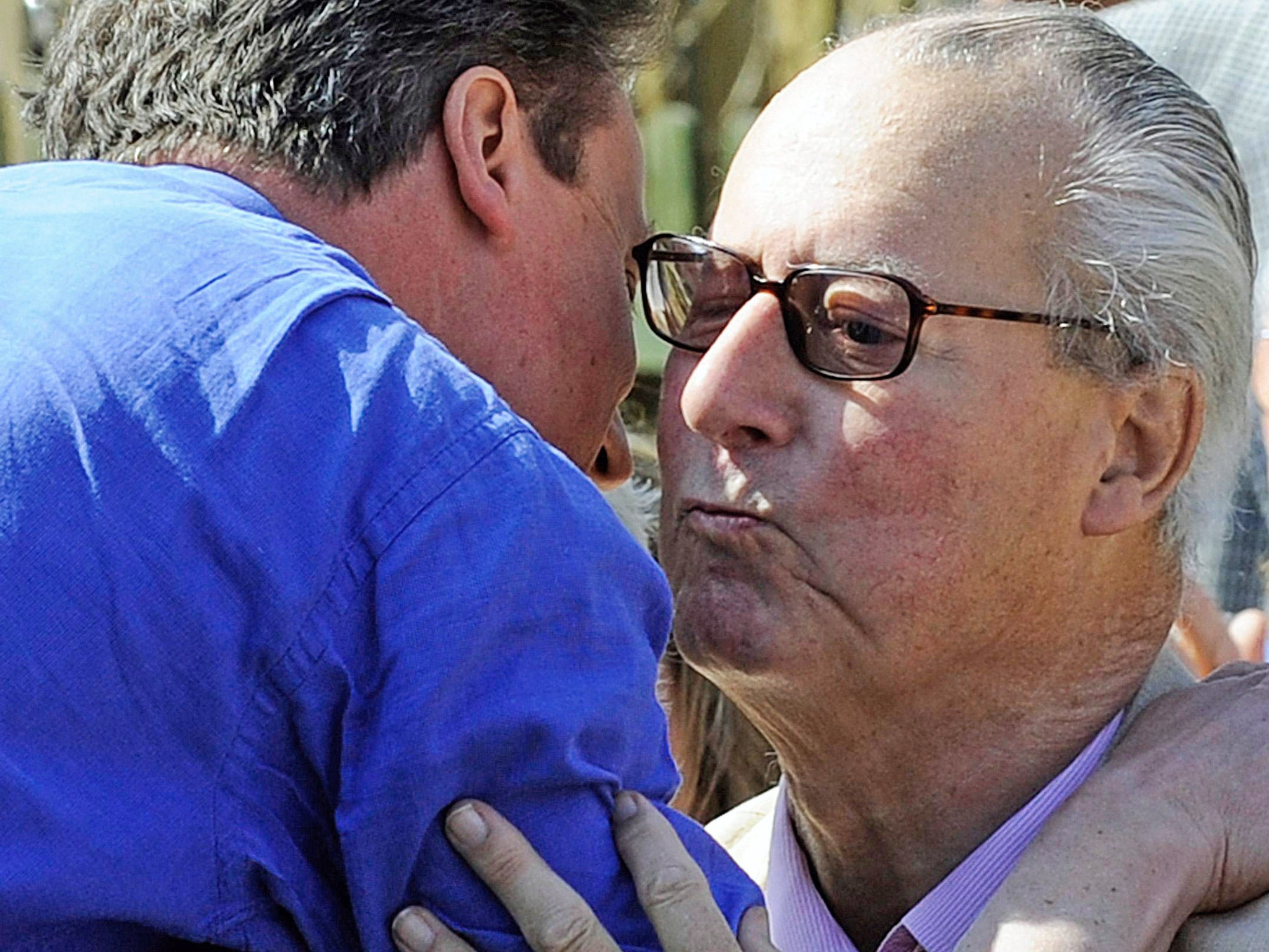 David Cameron embraces his father Ian during the 2010 election campaign