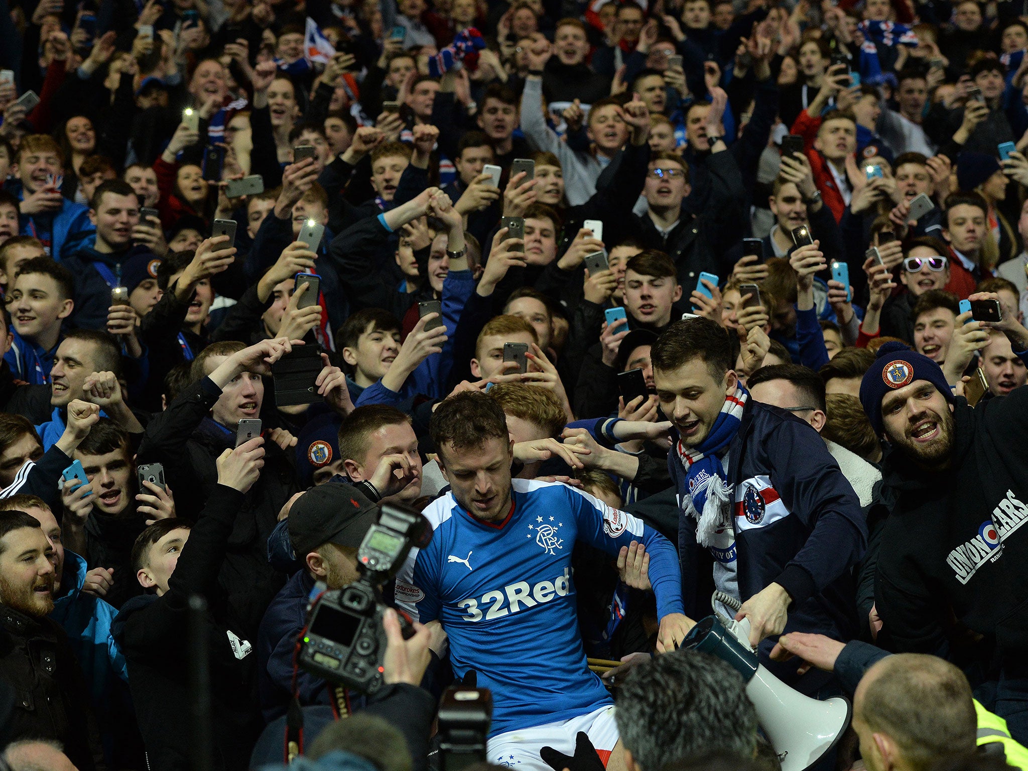 Andy Halliday joins Rangers supporters after securing promotion