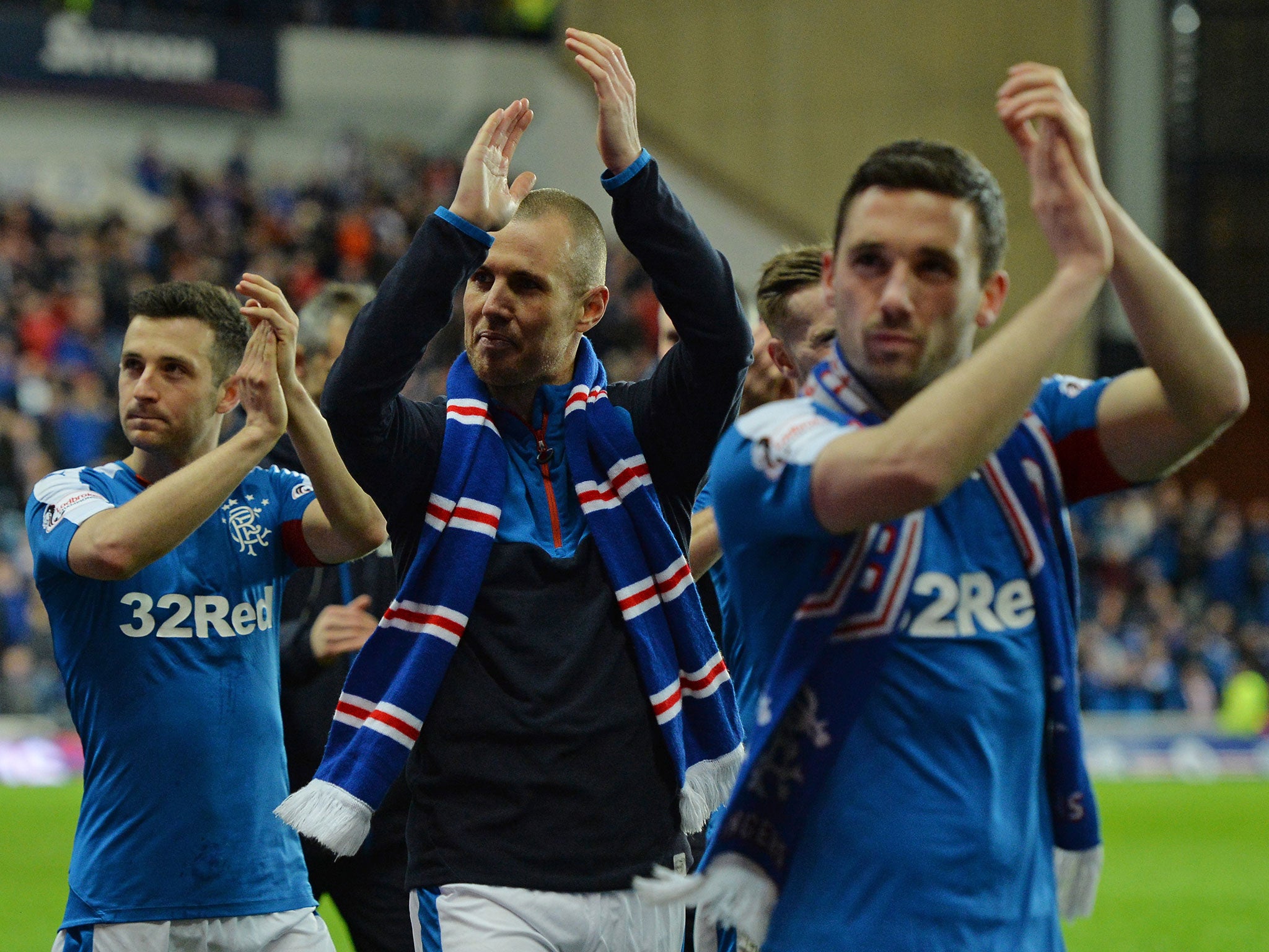 Rangers players celebrate promotion