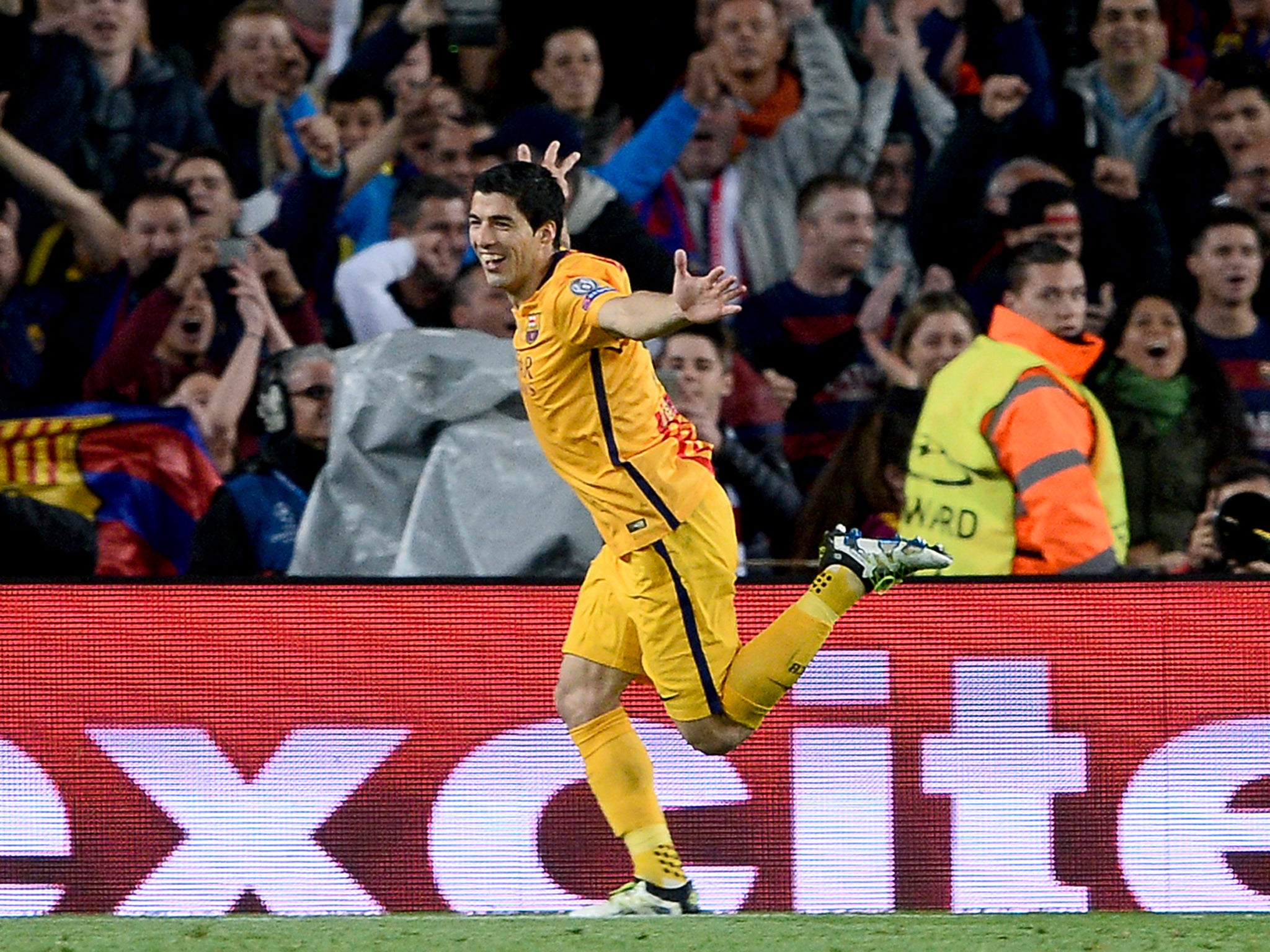 Luis Suarez celebrates his second goal against Atletico Madrid