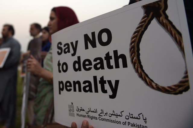 Human rights activists protest death penalty in Pakistan <em>Aamir Qureshi/Getty Images</em>
