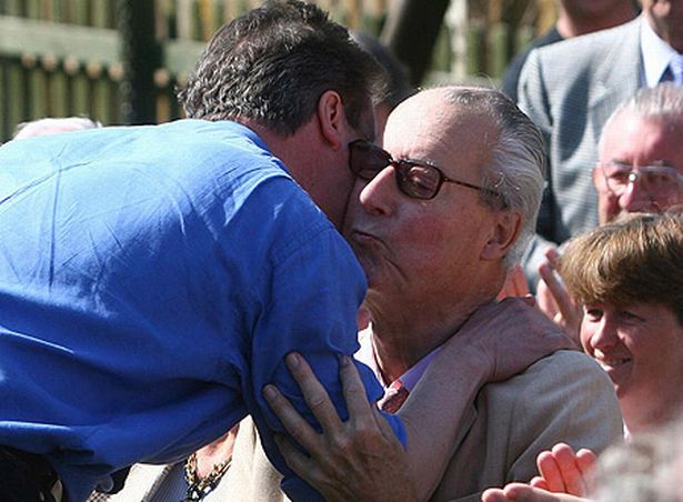 David Cameron kisses his father Ian in April 2010. Photograph: Getty