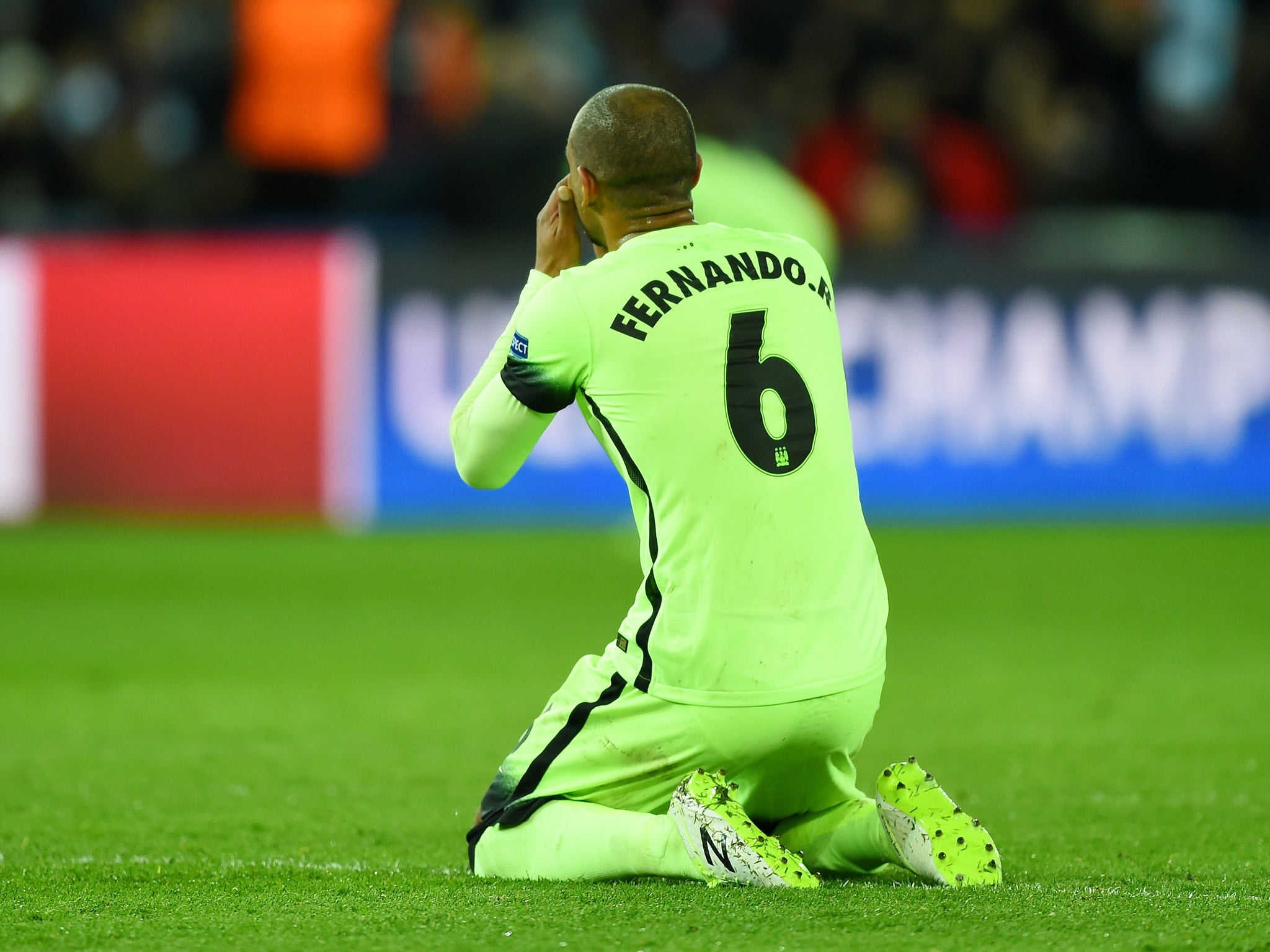 Manchester City midfielder Fernando goes down to his knees after his mistake