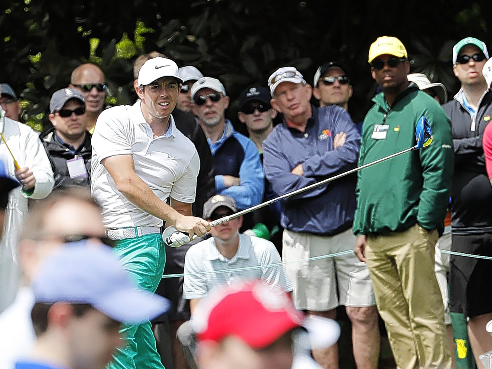 Rory McIlroy watches his ball after driving off the seventh tee during practice at Augusta