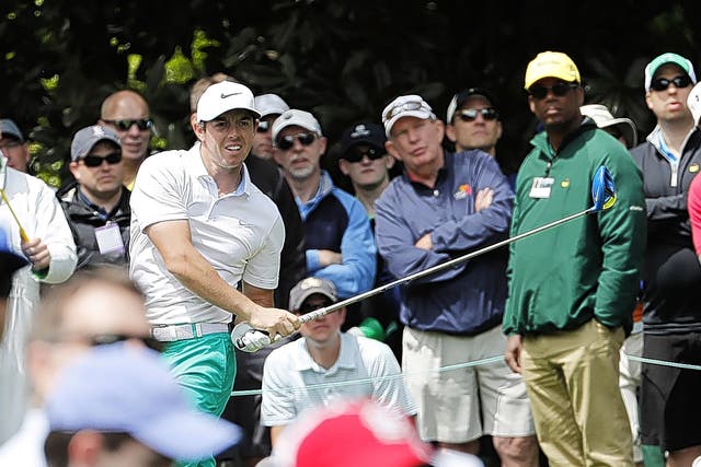Rory McIlroy watches his ball after driving off the seventh tee during practice  at Augusta