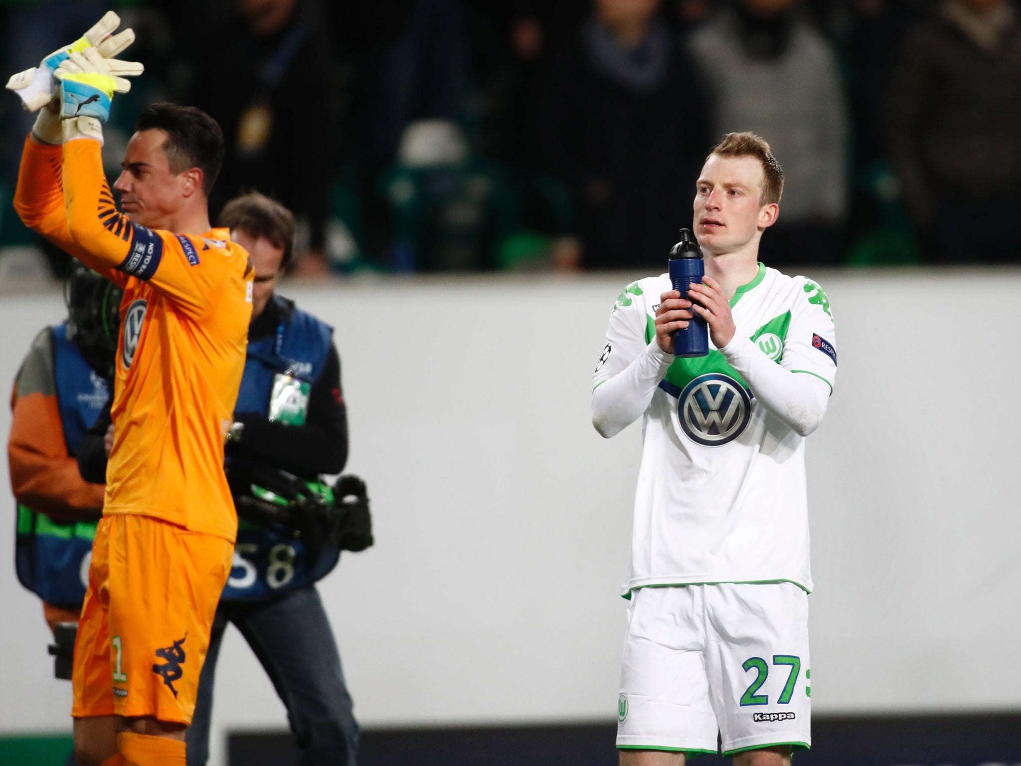 Maximilian Arnold salutes the fans after Wolfsburg’s first-leg win