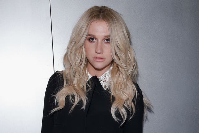 Zedd has posted photos which appear to show Kesha in a recording booth