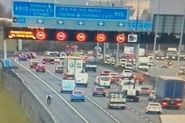 The man was spotted riding the wrong way along the M25