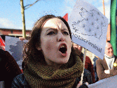 Hundreds of Northern Irish women protest abortion ban after two women prosecuted over terminations